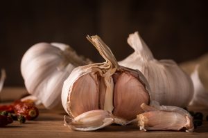 Garlic on the wooden background